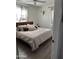 Bright bedroom with hardwood floors, ceiling fan, and neutral decor at 112 W Vogel Ave, Phoenix, AZ 85021