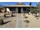 Charming single-story home featuring a covered porch and desert landscaping at 112 W Vogel Ave, Phoenix, AZ 85021