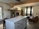 Spacious living room with exposed beams, fireplace, and modern furnishings at 112 W Vogel Ave, Phoenix, AZ 85021