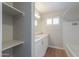 Bright bathroom featuring a vanity with ample storage and a tub with tiled surround at 1220 E Avenida Ellena St, Casa Grande, AZ 85122