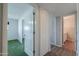 Bedroom featuring a mirrored closet and view into a bathroom at 1220 E Avenida Ellena St, Casa Grande, AZ 85122