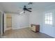 Light-filled bedroom with wood flooring, neutral walls and ceiling fan at 1220 E Avenida Ellena St, Casa Grande, AZ 85122