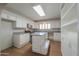 Updated kitchen with granite countertops, stainless steel appliances and lots of storage at 1220 E Avenida Ellena St, Casa Grande, AZ 85122