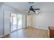 Bright room featuring sliding glass door to backyard with pool and deck at 1220 E Avenida Ellena St, Casa Grande, AZ 85122