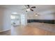 Open floor plan showcases living room and updated kitchen with an island at 1220 E Avenida Ellena St, Casa Grande, AZ 85122