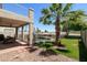 Spacious backyard features a patio, desert landscaping, privacy fence, and swimming pool at 12209 W Washington St, Avondale, AZ 85323