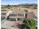 Exterior view of home with tile roof, two-car garage, and front yard with desert landscaping at 12209 W Washington St, Avondale, AZ 85323