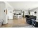 Open-concept living space with dining area and breakfast bar offers ample space for Gathering gatherings at 12209 W Washington St, Avondale, AZ 85323