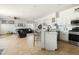 Spacious living area showcasing seamless integration of the kitchen, living and dining areas at 12209 W Washington St, Avondale, AZ 85323