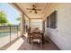 Comfortable covered patio with outdoor dining set perfect for relaxing near the pool at 12209 W Washington St, Avondale, AZ 85323