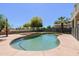 Beautiful backyard pool area with desert landscaping, privacy fence and string lights at 12209 W Washington St, Avondale, AZ 85323
