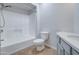 Bathroom featuring neutral walls, a toilet, and a shower-tub combo at 1331 W Baseline Rd # 120, Mesa, AZ 85202