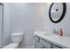 Bathroom featuring neutral walls, granite countertop, sink, and a toilet at 1331 W Baseline Rd # 120, Mesa, AZ 85202