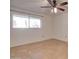 This cozy bedroom is filled with natural light from its large window at 1331 W Baseline Rd # 120, Mesa, AZ 85202