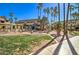 Expansive outdoor area with green space and palm trees, ideal for leisure and recreational activities at 1331 W Baseline Rd # 120, Mesa, AZ 85202