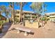 Comfortable seating area with a grill station offering a perfect outdoor space for relaxation and community gatherings at 1331 W Baseline Rd # 120, Mesa, AZ 85202