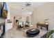 Spacious living room featuring tile floors, modern decor, and an open layout at 15037 N 114Th Way, Scottsdale, AZ 85255
