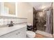 Modern bathroom with a shower and neutral-toned walls at 1617 W Pecan Rd, Phoenix, AZ 85041