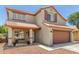 Charming two-story home features a well-maintained exterior, two-car garage, and lovely curb appeal at 1617 W Pecan Rd, Phoenix, AZ 85041