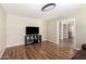 Bright, neutral living room with wood-look floors and ample space for entertainment at 1617 W Pecan Rd, Phoenix, AZ 85041