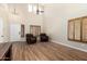 Bright living room with high ceilings, hardwood floors, and abundant natural light at 1617 W Pecan Rd, Phoenix, AZ 85041