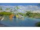 Inviting community water park with slides, splash pads, and plenty of fun for all ages at 16551 W Desert Ln, Goodyear, AZ 85338