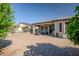 Large backyard with extensive brick pavers, mountain views, and plenty of space for entertaining at 17520 W Fairview St, Goodyear, AZ 85338