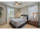 Bedroom with a queen bed, harp, lots of light, and neutral colors at 1776 E Laddoos Ave, Queen Creek, AZ 85140