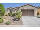 Charming single-story home featuring desert landscaping and a two-car garage at 1776 E Laddoos Ave, Queen Creek, AZ 85140