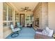 Charming outdoor patio with fireplace, comfortable seating, and plenty of natural light at 1776 E Laddoos Ave, Queen Creek, AZ 85140