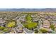 Community aerial showcasing the homes and landscape with mountains in the background at 18419 W Maui Ln, Surprise, AZ 85388