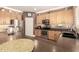 Functional kitchen equipped with stainless steel appliances and ample counter space at 18419 W Maui Ln, Surprise, AZ 85388