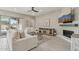 Cozy living area with fireplace and access to the outdoors, ideal for relaxing and entertaining at 18530 E Mockingbird Ct, Queen Creek, AZ 85142