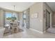 Bright dining area featuring stylish light fixture and views to the exterior at 18530 E Mockingbird Ct, Queen Creek, AZ 85142