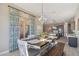 Dining area with views to the kitchen and an exterior view at 18530 E Mockingbird Ct, Queen Creek, AZ 85142