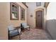 Charming entryway with seating and inviting decor, creating a warm welcome to the home at 18530 E Mockingbird Ct, Queen Creek, AZ 85142