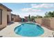Stunning backyard pool with patio and a tranquil setting for outdoor relaxation and entertainment at 18530 E Mockingbird Ct, Queen Creek, AZ 85142