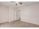 Bedroom with carpet, a ceiling fan, a closet, and a door leading to the en suite bathroom at 1918 S Shannon Dr, Tempe, AZ 85281