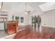 Open floor plan with wood floors and granite countertops open to the dining area at 1918 S Shannon Dr, Tempe, AZ 85281