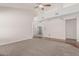 Bright living room featuring vaulted ceilings, carpet and hardwood flooring at 1918 S Shannon Dr, Tempe, AZ 85281