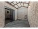 Enclosed patio with wooden deck floor and covered ceiling with lights at 1918 S Shannon Dr, Tempe, AZ 85281