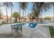 Community pool featuring sun-drenched deck, palm trees, and inviting waters, perfect for relaxation at 1918 S Shannon Dr, Tempe, AZ 85281