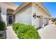 Beautiful single-Gathering home boasting a two-car garage and a decorative gate at 20608 N 57Th Ave, Glendale, AZ 85308