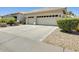 Beautiful single Gathering home featuring a two car garage and desert landscaping at 20608 N 57Th Ave, Glendale, AZ 85308
