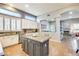 Bright, open kitchen with a large island, granite countertops, and ample natural light at 20608 N 57Th Ave, Glendale, AZ 85308