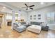 Bright living room with a comfortable sectional sofa and an open view to the kitchen at 20608 N 57Th Ave, Glendale, AZ 85308