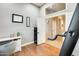 Bright home office featuring hardwood floors and a doorway leading to additional rooms at 20608 N 57Th Ave, Glendale, AZ 85308