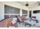 Covered patio with comfortable seating and overhead lights is perfect for relaxation at 20608 N 57Th Ave, Glendale, AZ 85308