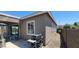 A view of the backyard with the BBQ, window, and patio at 20838 E Vía De Arboles --, Queen Creek, AZ 85142