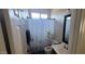 Cozy bathroom with shower and floral shower curtain at 20838 E Vía De Arboles --, Queen Creek, AZ 85142
